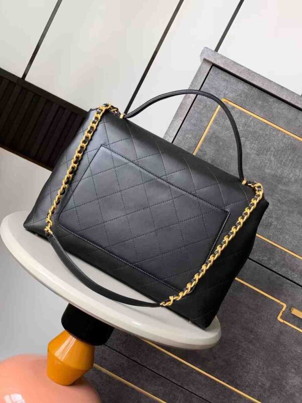 Maxi flap bag with top handle, Calfskin & gold-tone metal - Image 3